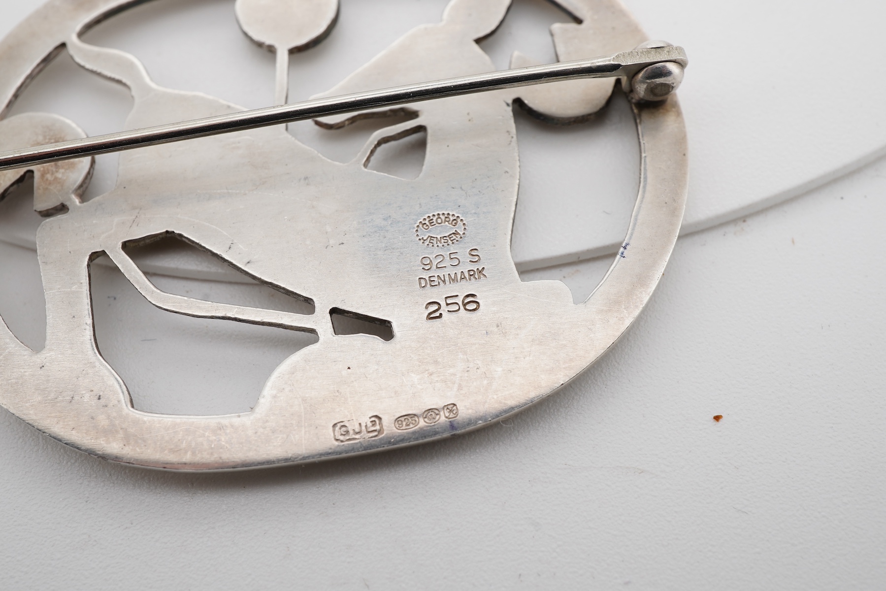 A Georg Jensen sterling kneeling deer oval brooch, design no. 256, 44mm.